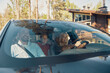 © gstockstudio - Young happy family with little boy having fun and smiling while driving in the car