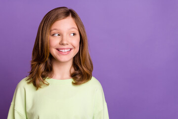 Sticker - Photo of young lovely preteen girl happy positive smile curious look empty space isolated over purple color background