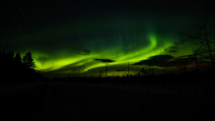 Wall Mural - northern lights and clouds in northern sweden
