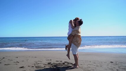 Wall Mural - Happy young couple at the sea vacations