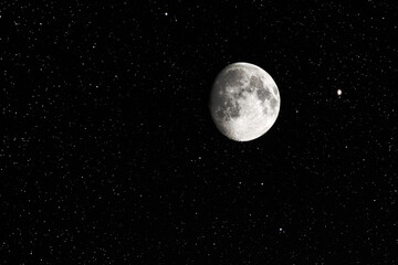 Wall Mural - waxing gibbous moon and stars on a clear sky
