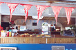 © Wavebreak Media - General view of food truck with ready food and red bunting