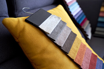 Wall Mural - Colorful upholstery fabric samples on the sofa