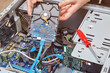 © grigvovan - Removing computer hard drive from system unit to replace it with new one.