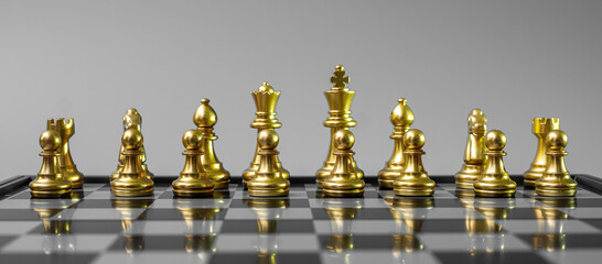 Wall Mural - gold Chess figure team (King, Queen, Bishop, Knight, Rook and Pawn) on Chessboard against opponent during battle. Strategy, Success, management, business planning, think,education and leader concept