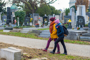 Poster - Romantic lesbian couple walking in a cemetery