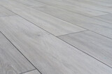 Fototapeta  - Natural solid species of wood laminate parquet floor texture, close up still life background
