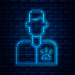 Wall Mural - Glowing neon line Veterinarian doctor icon isolated on brick wall background. Vector