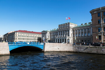 Wall Mural - View of the Blue Bridge over the Moika River in St. Petersburg on a sunny summer day. Russia