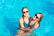© len44ik - Happy beautiful girls having fun at the pool