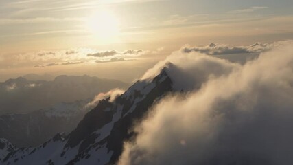 Wall Mural - aerial dramatic north cascade mountains winter sunset