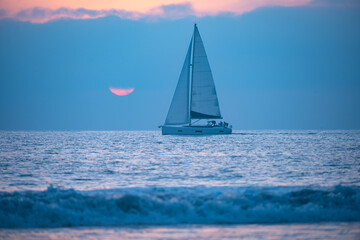  Sailboat on the ocean. Landscape of sea and tropical beach. Beautiful seascape nature. Travel and vacation, copy space.