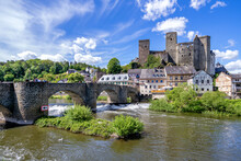 River Lahn In Runkel, Germany With Old Stone Bridge And Castle