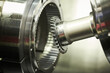 © Kadmy - gear skiving operation on cnc machine in metalworking industry. Cutting tool makes internal tooth with mill