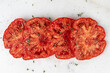 © Stacy Howell - Closeup of heirloom tomato slice
