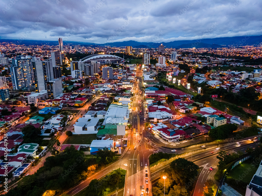 Beautiful aerial view of the city of San Jose Costa Rica At Night with lots of lights  - obrazy, fototapety, plakaty 