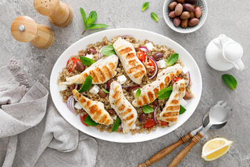 Wall Mural - Grilled chicken breast and greek salad with quinoa