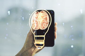 Poster - Creative light bulb with human brain hologram and hand with cellphone on background, artificial Intelligence and neural networks concept. Multiexposure