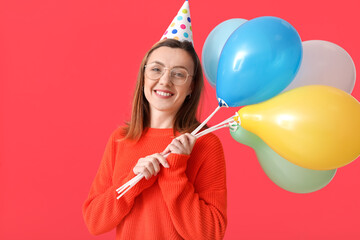 Sticker - Beautiful woman with balloons on color background