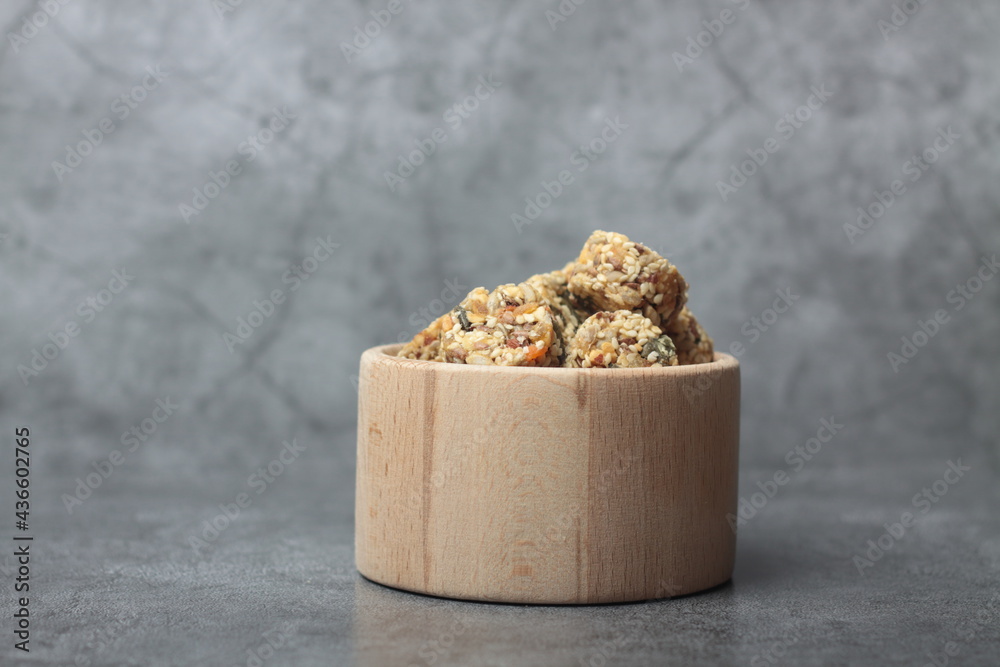 Healthy eating concept - a bowl of crunchy on gra background - obrazy, fototapety, plakaty 