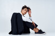 © SHOTPRIME STUDIO - curly haired man in classic suit model studio photography sneakers