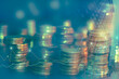 Investment finance concept, Double exposure of city night and stack of coins for finance investor, Cryptocurrency Digital economy background for Business invest