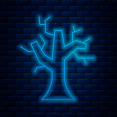 Sticker - Glowing neon line Withered tree icon isolated on brick wall background. Bare tree. Dead tree silhouette. Vector