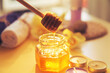 Honey is poured into the jar. Spa care concept.