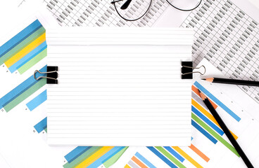 Poster - Notebook with pencils, glasses on graph background, copy space