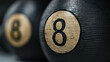 Closeup shot of number 8 black billiard ball with blurred reflection on the side