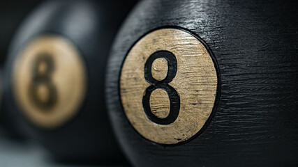 Poster - Closeup shot of number 8 black billiard ball with blurred reflection on the side