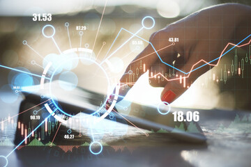 Poster - Digital data mining and machine learning technology concept with virtual circle with indicators and financial chart candlestick and diagram on woman finger on digital tablet screen outdoors background