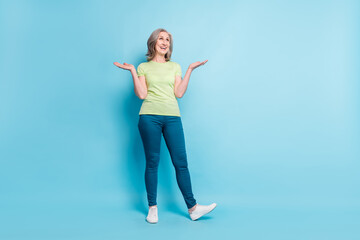 Sticker - Full length body size photo senior business woman laughing unsure got doubt shrug shoulders isolated pastel blue color background