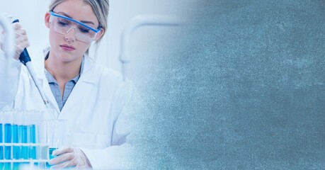 Poster - Composition of female lab technician using pipette, with blue blurred copy space to right