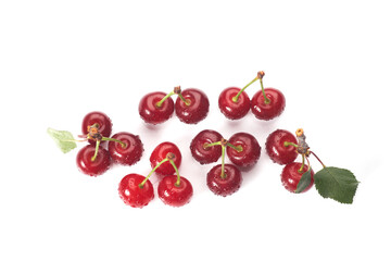 Image cherries on a white background. Cherries with drops isolated on white background