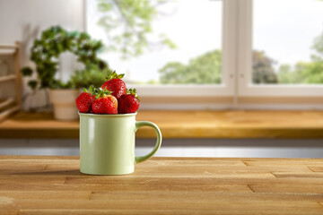 Poster - Fresh red fruits on desk in kitchen interior and free space for your decoration 