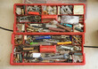 Toolbox of a carpenter. View from above the box full of tools and objects of use for the work of a carpenter 