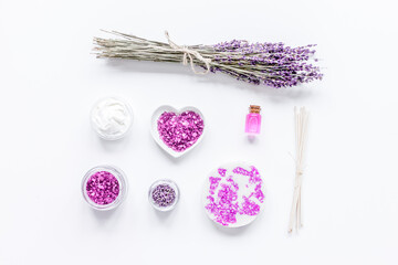 Wall Mural - lavender flowers in organic cosmetic set on white background top view mock-up