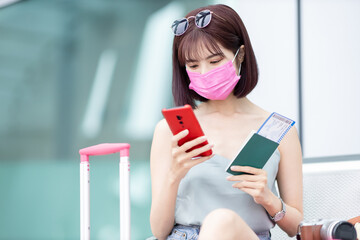 Poster - Asian female traveler at airport