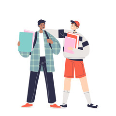 Wall Mural - Two boy stand together and talk. School friends, teen schoolboys with backpacks and books