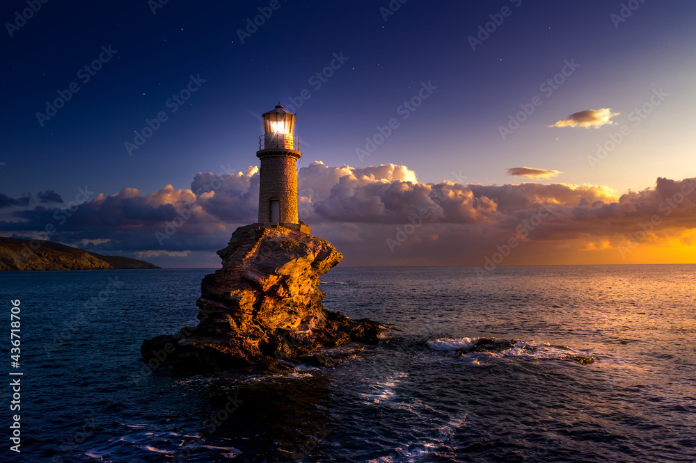 The beautiful Lighthouse Tourlitis of Chora at night. Andros