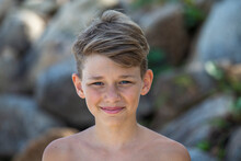 Young Boy Is Enjoying On The Beautiful Tropical Beach At Summer, Close Up Portrait