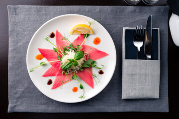 Wall Mural - Tuna carpaccio on a plate