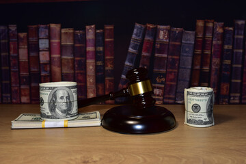 Judge hammer and bundles of dollars. Justice in courtroom. Mallet of judge on law theme and legal system. Risk tools help judges decide and punishment. World bribery and scam. Credit and financial