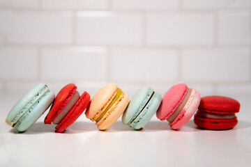 colorful macaroons on a white background subway tile  t