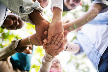 Wall Mural - Group of diverse youth hands joined