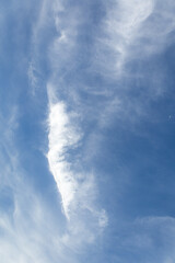 Wall Mural - wispy clouds and blue sky suitable for background