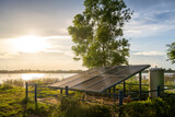 Fototapeta Miasta - Solar cell green energy for water pump at reservoir