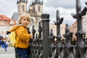 Cute child, boy, visiting Prague after the quarantine Covid 19