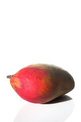 Wall Mural - A ripe mango fruit isolated over white background
